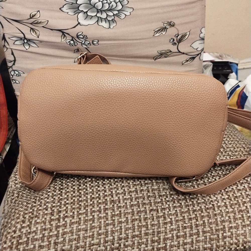 Crossi women's tan bow mini back pack w/ adjustable straps and interior pockets - Picture 10 of 12